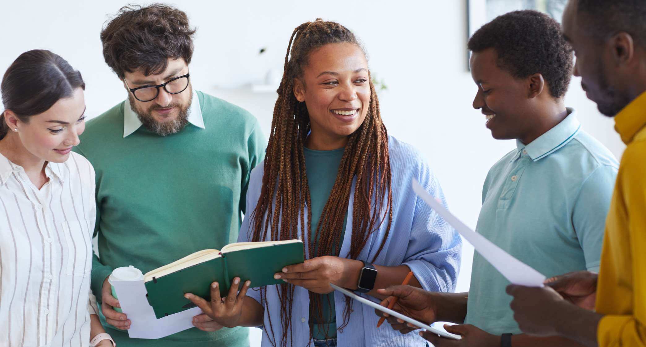 group of medical staff smiling and looking at the camera